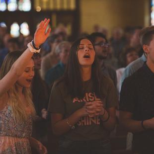 Awakening students worshiping in Dimnent Chapel
